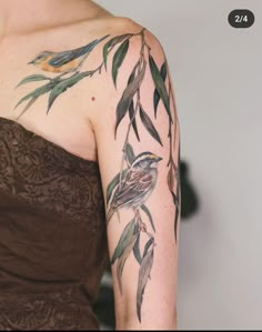 a woman with a tattoo on her arm