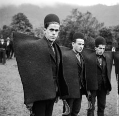 Iranian shepherds from the north in the early 1950s wearing traditional heavy woollen mantles. They are standing ready to shear sheep with sycthe-like shears...... People Of The World, World Cultures, Fashion History, Traditional Dresses, Traditional Outfits, Old Photos