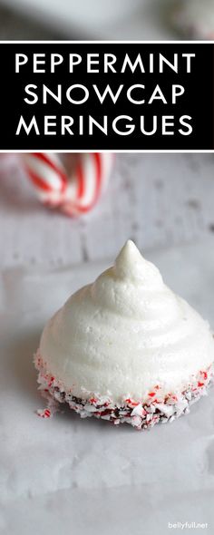 peppermint snowcap meringues with white frosting and sprinkles