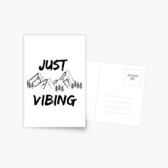 a postcard with the words just vibing on it and mountains in the background