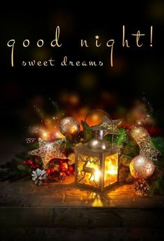 a lantern and christmas decorations with the words good night sweet dreams