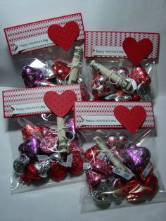 valentine's day candies in cello bags with heart shaped candy wrappers on them