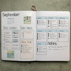 an open planner with notes attached to it