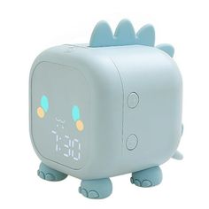 an alarm clock is shaped like a cat