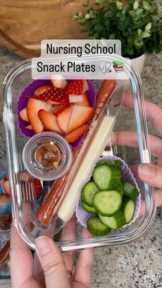 someone is holding up a plastic container with food in it and the words nursing school snack plates