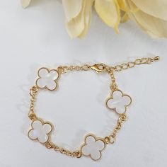 Gold Plated Chic Motif Bracelet. Made Of 4 White Mother Of Pearl Leaf Clover Charms. Measures 7 To 8.5 Inches Adjustable. Elegant And Dainty Bracelet. Brings Good Luck. Great Quality, Lasts Long And Wont Change Color. Simple Gold Bangle, Stacked Beaded Bracelets, Elephant Charm Bracelet, Birthday 10, Dr Wardrobe, White Clover, Bff Jewelry, Girls Stuff, Faux Pearl Bracelet