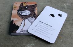 an animal business card sitting on the ground