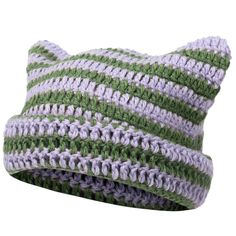 a green and white striped knitted pillow