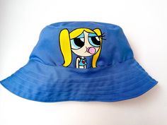 Bucket Hat, Blue Bucket Hat, Bubbles Powerpuff girls Handmade Fashionable and comfortable bucket hat head accessory. Perfect for covering the face and eyes from sun All hats are painted by hand so there might be some ever-so-slight differences (maybe a thicker/thinner brush stroke in some spots) No screen printing or vinyl transfers, it's all made from the heart baby :) IMPORTANT CARE INSTRUCTIONS: Hand wash, Spot clean, Air dry only, Do not bleach! Spot wash using a bleach-free, environmentally Bubbles Powerpuff, Power Puff Girls Bubbles, Blue Bucket Hat, Girls Handmade, Vinyl Transfer, Dry Bag, Head Accessories, Bucket Hats, Clean Air