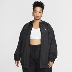 With a classic sport look and a lightweight feel, this jacket is ready for whatever the day throws at you. Dropped shoulders and an oversized fit gives you a casual feel that you can rock all day. Athleisure Moisture-wicking Outerwear For Streetwear, Athleisure Outerwear With Moisture-wicking For Streetwear, Black Athleisure Windbreaker With Drawstring Hood, Moisture-wicking Athleisure Outerwear For Streetwear, Casual Nylon Hooded Jacket With Moisture-wicking, Oversized Athleisure Hooded Jacket With Adjustable Hood, Relaxed Fit Athleisure Hooded Jacket, Oversized Black Windbreaker With Double-lined Hood, Nike Moisture-wicking Hooded Jacket For Streetwear