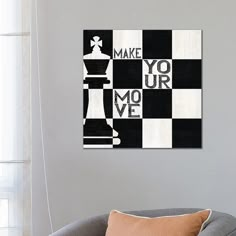 a black and white chess board with the words make your move on it