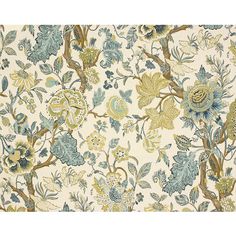 an upholstered floral wallpaper with blue, yellow and green flowers on it