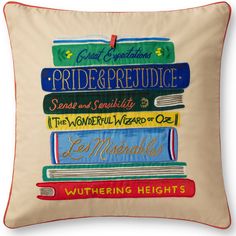 a pillow with books on it that says, pride and prejuce the wonderful wizard of