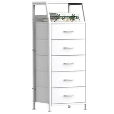 a tall white cabinet with five drawers