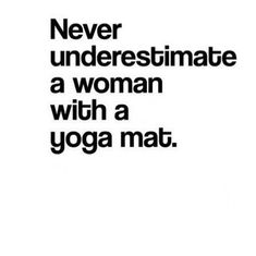 a woman with a yoga mat in her hand and the words never underestimate a woman with a yoga mat