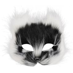 a black and white cat mask with fluffy fur on the top of it's face