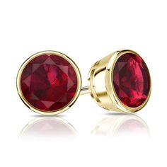 A dazzling ruby gemstone in round cut stud earrings that takes an approximate 0.50 ct. total weight comes in a 18k yellow gold bezel set and is available with push-back or screw back clasps. Ruby Stud Earrings, Black Diamond Pendant, Blue Sapphire Studs, Black Diamond Studs, Halo Diamond Earrings, Ruby Earrings Studs, Colored Diamond Rings, Sapphire Earrings Studs, Emerald Earrings Studs