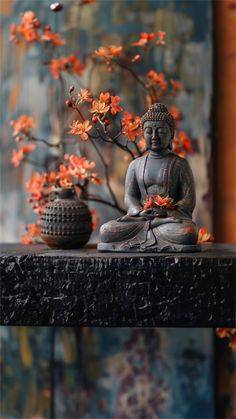 a buddha statue sitting on top of a wooden table