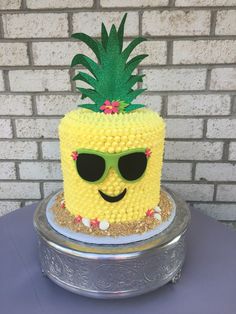 a pineapple cake with sunglasses on top