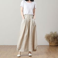 Cool and comfortable for hot summer days, this natural linen skirt is elegant and stylish. It is a wonderful wardrobe staple that's a timeless classic you'll wear again and again.Pure natural linen materials, comfortable, breathable, refreshing and soft fabric. All our items are Tailored and Handmade and Made to Order ,I can make Any Size . I design new styles every week, please collect my store. I believe that you will meet your favorite styles. ★★FEATURES Linen 55% + Cotton 45% ( Medium Weight Linen Lined Skirt For Vacation, Relaxed Fit Skirted Bottoms With Pockets, Solid Color Cotton Skirt For Vacation, Solid Cotton Skirt For Vacation, Cotton Skirt For Vacation, Linen Long Skirt For Vacation, Long Linen Skirt For Vacation, Casual High Waist Cargo Skirt For Summer, Baggy Maxi Skirt For Summer