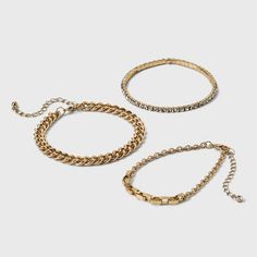 Add some shine to your day with the 3-Piece Cup Chain Bracelet Set from A New Day™. This three-piece bracelet set includes one with  a linked chain, one with studded stones and one cup chain to give you elegant choices for decorating your wrist in style. Designed with extender chains, this gold-tone bracelet set is made with nickel-free metal to suit all types of skin, and can be worn as solo pieces or together.

A New Day™: Style that goes wherever you do. Cup Chain Bracelet, Bracelet Extender, Types Of Skin, Stone Studs, Three Piece, A New Day, Bracelet Set, Chain Bracelet, New Day