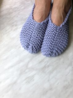 These gray and purple chunky slippers for women are handmade from high quality 25% wool and 75% acrylic yarn. The combination of these materials ensures that the slippers are not only cozy and warm, but also durable and easy to wash.  Designed like ballet flats, they're snug and comfortable, so they're perfect for wearing around the house as knitted slippers. Chunky Slippers, Knit Slippers, Slippers For Women, Crochet Bookmarks, Knitted Slippers, Cozy Gift, Knit Mittens, Wool Knit, Mens Gloves