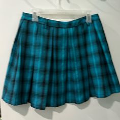 Hottopic Skirt. Blue/Black. Never Worn. Tags Are Missing. 16.5 Inches Long. Blue Short Pleated Skirt Lined, Blue And Black Plaid Skirt, Blue Pleated Short Mini Skirt, Hot Topic Skirts, Mid-rise Blue Mini Skirt With Pockets, Hot Topic, Pleated Skirt, Blue Black, Womens Skirt