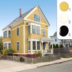 a yellow house with three different colors on it