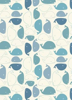 a blue and white whale pattern on a light colored background with smaller whales in the ocean