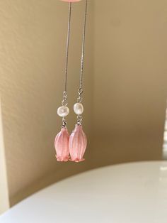 A beautiful and unique botanical inspired earrings features pink lily flower bud.  Wear them to reflect your love for the nature and art! These pendants makes a great gift for Christmas birthdays, Valentine's Day, and Mother's day. Feminine Flower Earrings With Ear Wire For Gifts, Feminine Blossom Earrings For Gift, Feminine Flower-shaped Earrings For Gifts, Feminine Handmade Flower Earrings For Gift, Handmade Flower Earrings As Feminine Gift, Handmade Feminine Flower Earrings For Gifts, Adjustable Flower Decorated Earrings For Gifts, Feminine Flower Decorated Earrings For Gift, Delicate Petal Shaped Flower Earrings As Gift