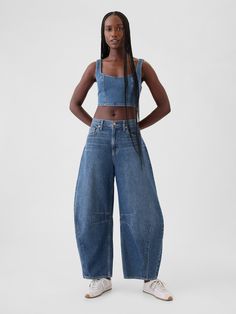 Fit:  An ankle-length horseshoe jean that's fitted at the waist with an exaggerated curved leg and tapered ankle.  Fabric: 95% Cotton, 5% Recycled Cotton.  Stretch: No Stretch Jeans.  Authentic denim that gets better with every wear.  Made to wear all day & break in over time.  Rise:   Mid Rise Jeans.  Look: A classic five-pocket horseshoe jean in a dark indigo wash.  Details: Zip fly, five-pocket styling & seams at sides.  Responsibly Made: This pair of jeans is part of our water-saving Washwel