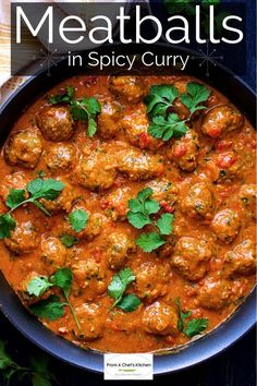 meatballs in spicy curry with cilantro and parsley garnishes