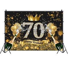 70th birthday banner with champagne and streamers