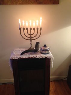 the menorah is lit up and ready to be used for hanukkah