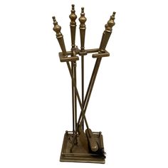 a metal candle holder with five candles on it