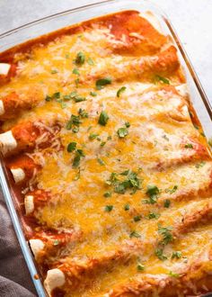 a casserole dish filled with meat and cheese