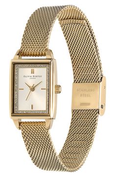 A border of twinkling crystals and a sunray dial glam up this slender rectangular watch set on a slinky mesh band for lustrous shine. 20mm case, 12mm band width Quartz movement Stainless steel with ionic plate Imported Women’s Gold Watch, Dainty Watches For Women, Women’s Watch, Trending Watches For Women, Building Closet, Dainty Watches, Rectangular Watch, Frock And Frill, Watch Set