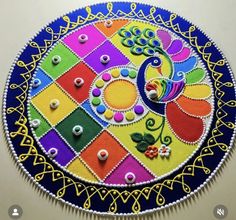 an intricately decorated plate with buttons and beads