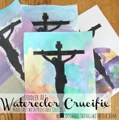 three watercolor crucifix paintings with the words toddler art watercolor crucifis