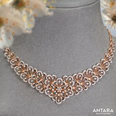 The mesmerising weave of this beautiful floral pattern and let the delicate diamonds bloom into a gorgeous & sparkling neck piece by Antara Jewellery to grace you! #NecklaceLover #GoldJewelleryMumbai #DiamondNecklace #enamelJewellery #BridalJewellery #enameljewelry #BridalPieces Delicate Diamond Necklace, Fashion Jewelry Necklaces Gold, Delicate Gold Jewelry, Diamond Jewelry Set, Diamond Pendants Designs, Fancy Jewelry Necklace, Designer Diamond Jewellery