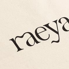 the word raeya written in black ink on a white background