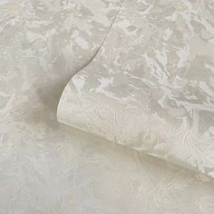 a close up view of an unmade bed sheet