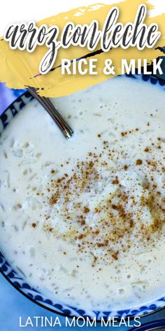 a bowl filled with rice and milk on top of a table