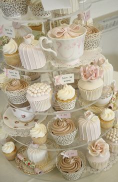 an image of cupcakes on a cake stand