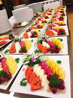 many plates with different types of food on them