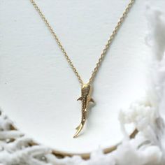 Stunning 14K real Gold 2.5 micron Gold Vermeil  Whale Shark Necklace  Size of charm 30mm x 10.8mm Choose from 450mm or 500mm. 14K Gold Vermeil chain (Base material is genuine .925 Sterling Silver) Tarnish Proof, water resistant. Please take care for longer lasting wear. (If worn in the ocean over long periods of time your Gold pieces may wear down to the sterling Silver base) Whale Shark Necklace, Whale Shark Jewelry, Cute Gold Jewelry, Shark Jewelry, Surf Jewelry, Shark Necklace, Beachy Jewelry, Ocean Necklace, Preppy Jewelry