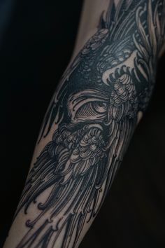 a person with a tattoo on their arm