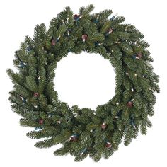 a christmas wreath with pine cones and lights