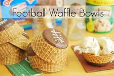 football waffle bowls are sitting on a table with ice cream and cookies in them