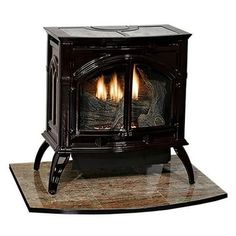 a black stove with two burners on the top and one flame in the middle